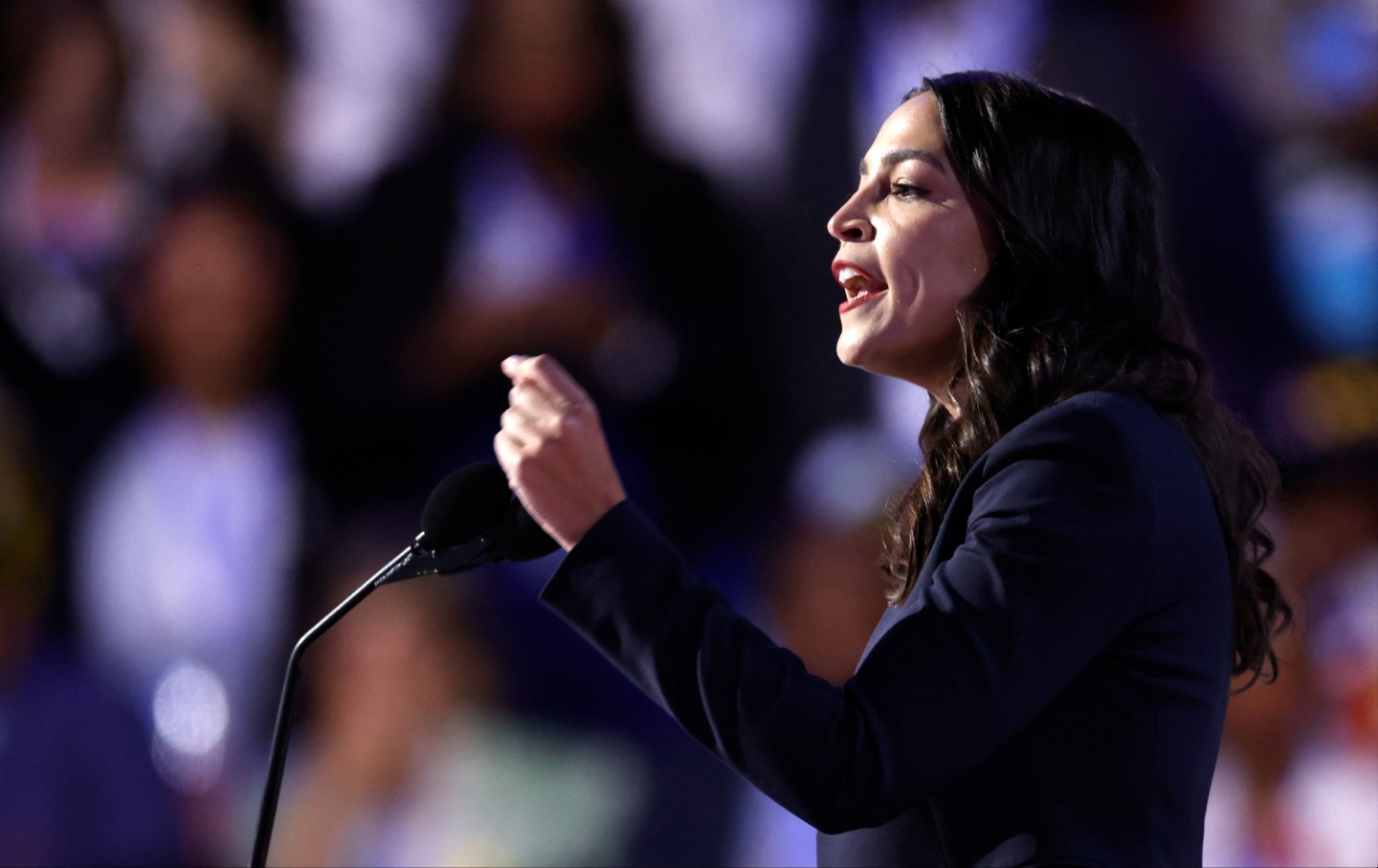 US Representative Alexandria Ocasio-Cortez (D-NY) speaks on the first day of the Democratic National Convention (DNC) at the United Center in Chicago, Illinois, on August 19, 2024.