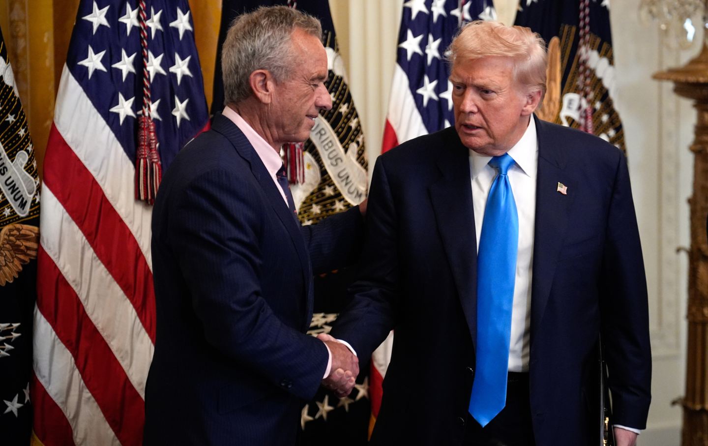 Robert F. Kennedy Jr. and Donald Trump during a “Making Health Technology Great Again” event in the East Room of the White House, on July 30, 2025.