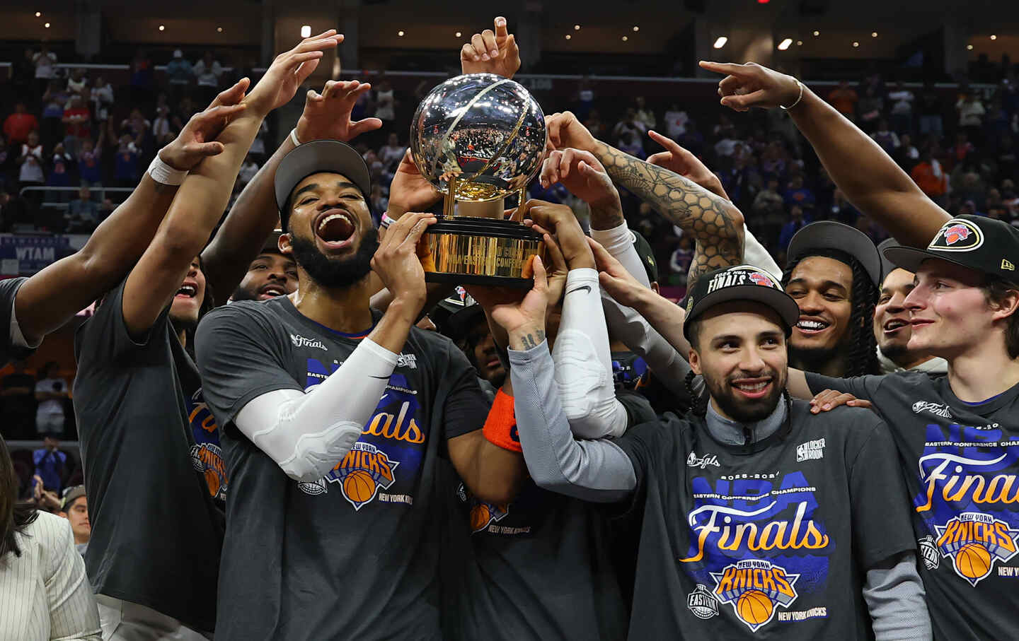 The New York Knicks celebrate with the Bob Cousy Trophy after defeating the Cleveland Cavaliers 130–93 in Game Four of the NBA Eastern Conference Finals.