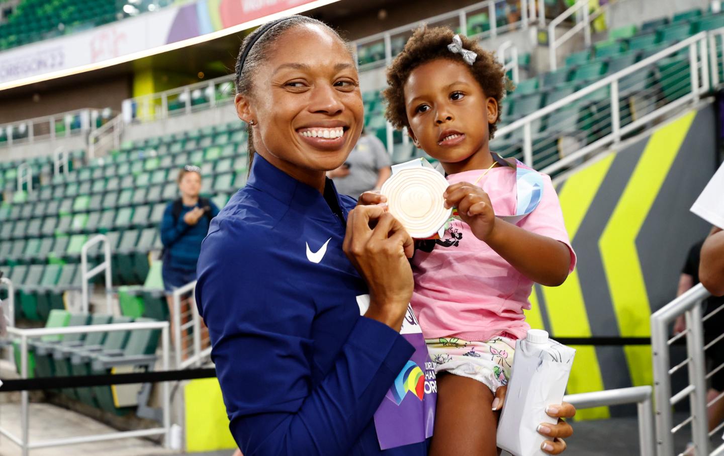 Track and field star Allyson Felix with her daughter, Camryn, at the 2022 World Athletics Championships in Eugene, Oregon.