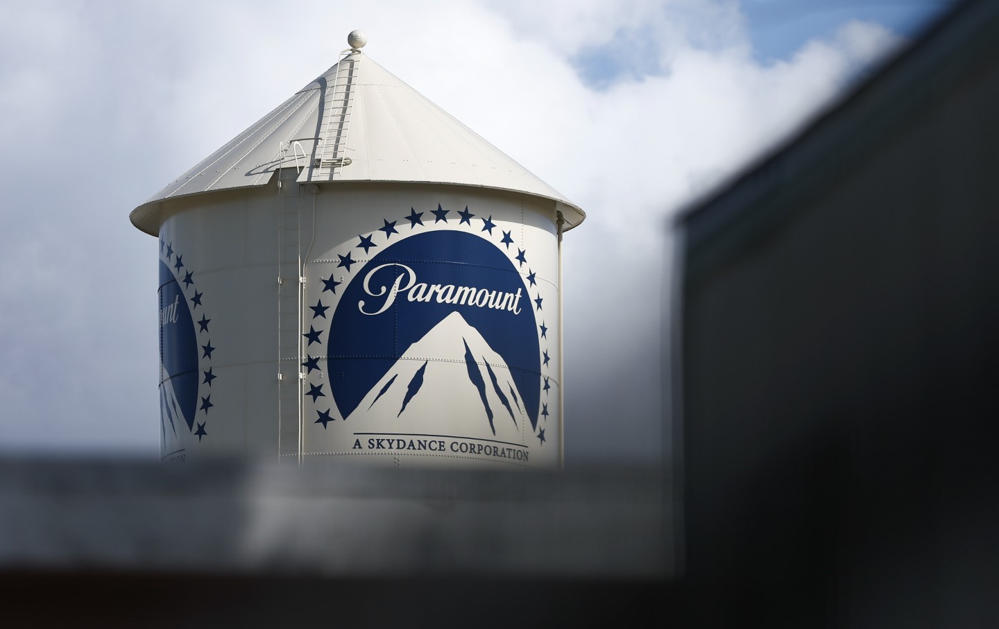 A water tower bearing the Paramount Pictures logo looms over Los Angeles on February 17, 2026.