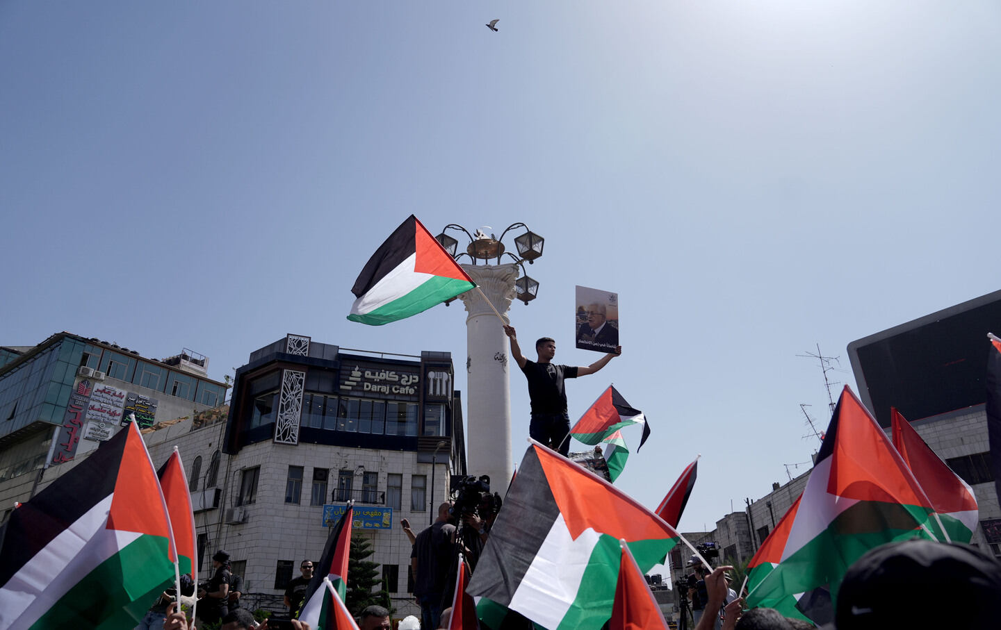 Demonstrators stage a protest to thank countries that recognize the State of Palestine and to demand an end to Israeli attacks on Gaza in Ramallah, West Bank, on September 23, 2025.