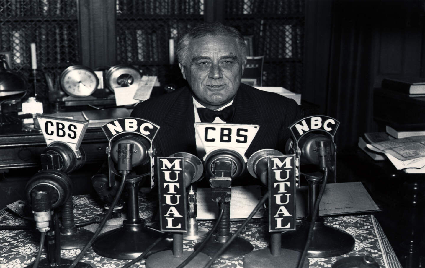 President Franklin D. Roosevelt endorses New Deal candidates during a radio broadcast from his Hyde Park home.