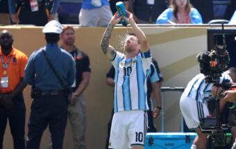 Argentina's Lionel Messi (10) sprays water on his face at the World Cup championship final soccer match between Spain and Argentina in East Rutherford, New Jersey, Sunday, July 19, 2026.