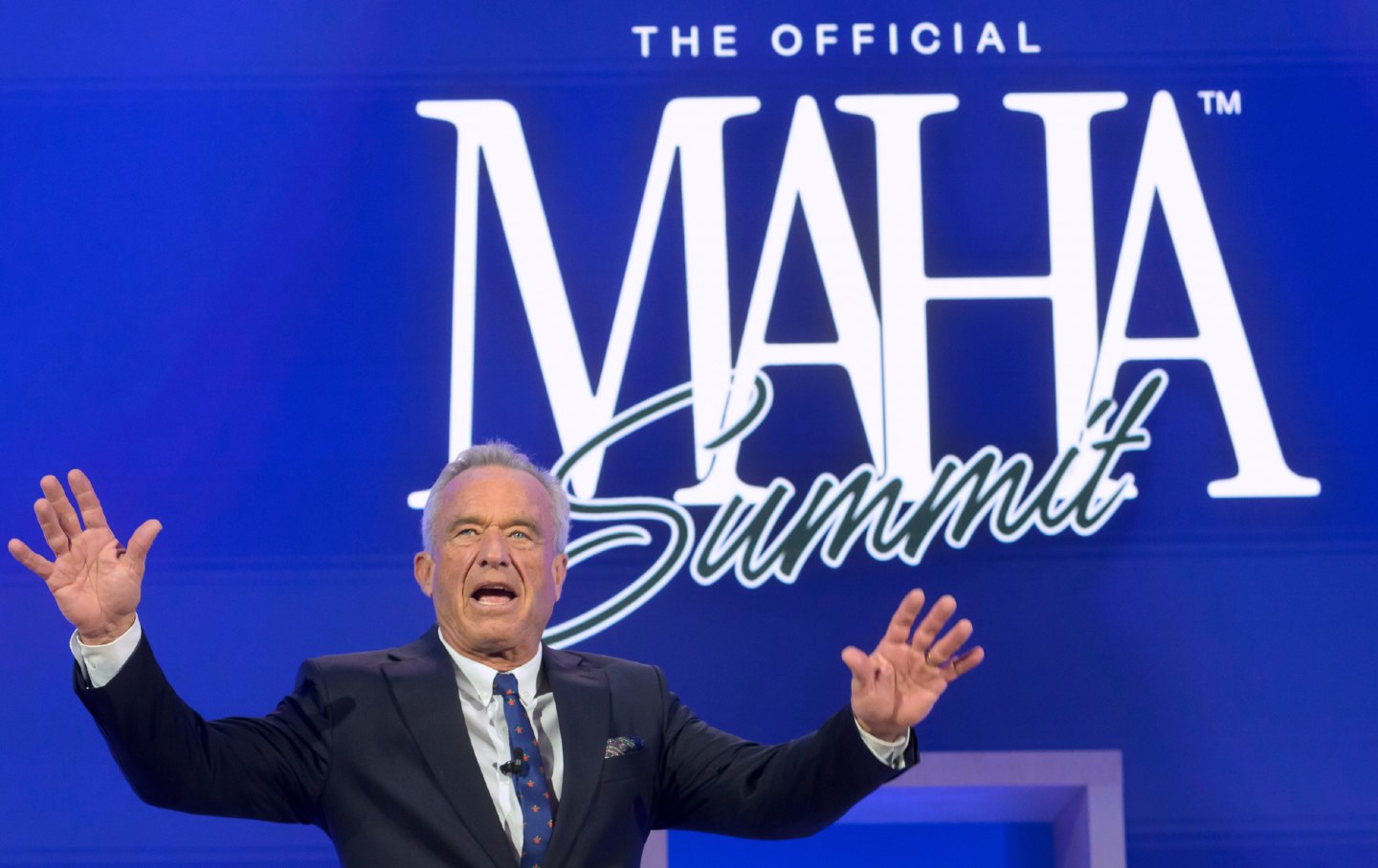Robert F. Kennedy, Jr., arrives on stage at the inaugural Make America Healthy Again summit, Nov. 12, 2025, in Washington.