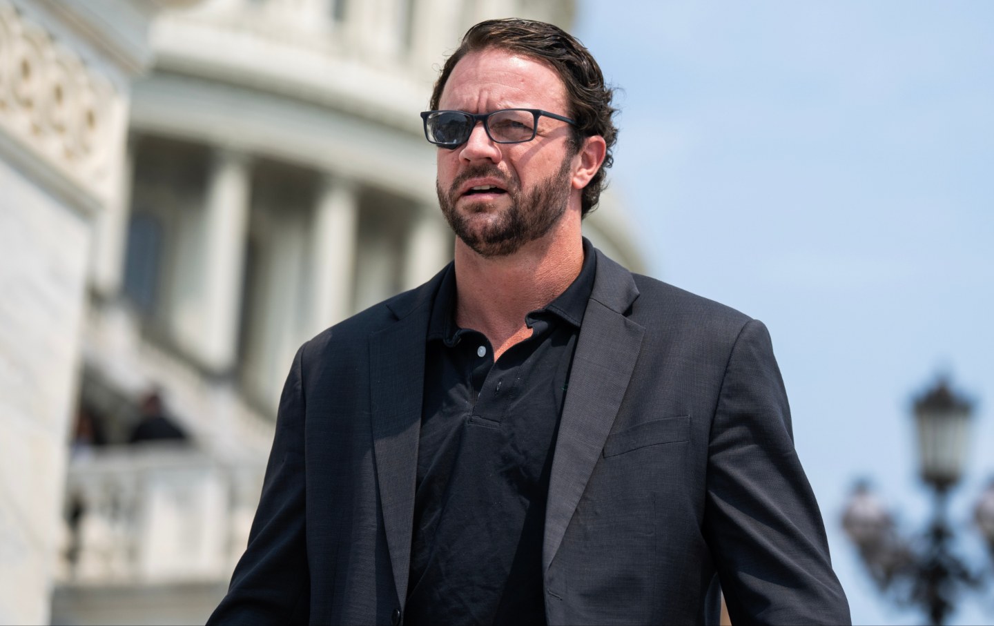 Rep. Dan Crenshaw, R-Texas, leaves the U.S. Capitol after the last votes of the week on Thursday, July 16, 2026.