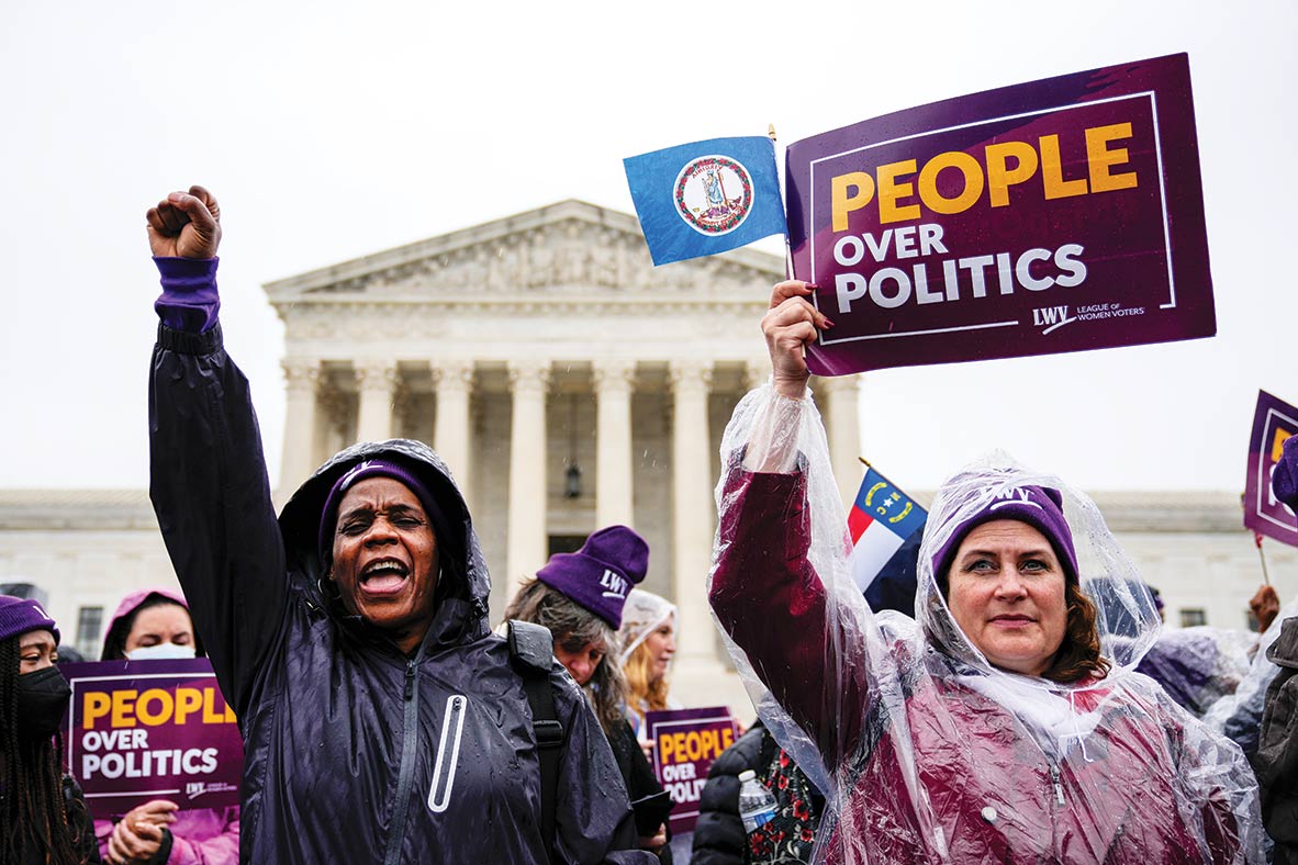 The League of Women Voters rally for voting rights as the Supreme Court hears oral arguments in a gerrymandering case in 2022.