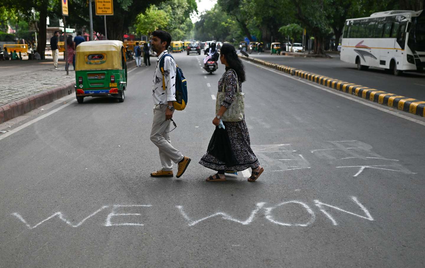 In New Delhi, India, on July 26, the words “WE WON” are seen written on the pavement following the resignation of Education Minister Dharmendra Pradhan, meeting a key demand of the Cockroach Janta Party.