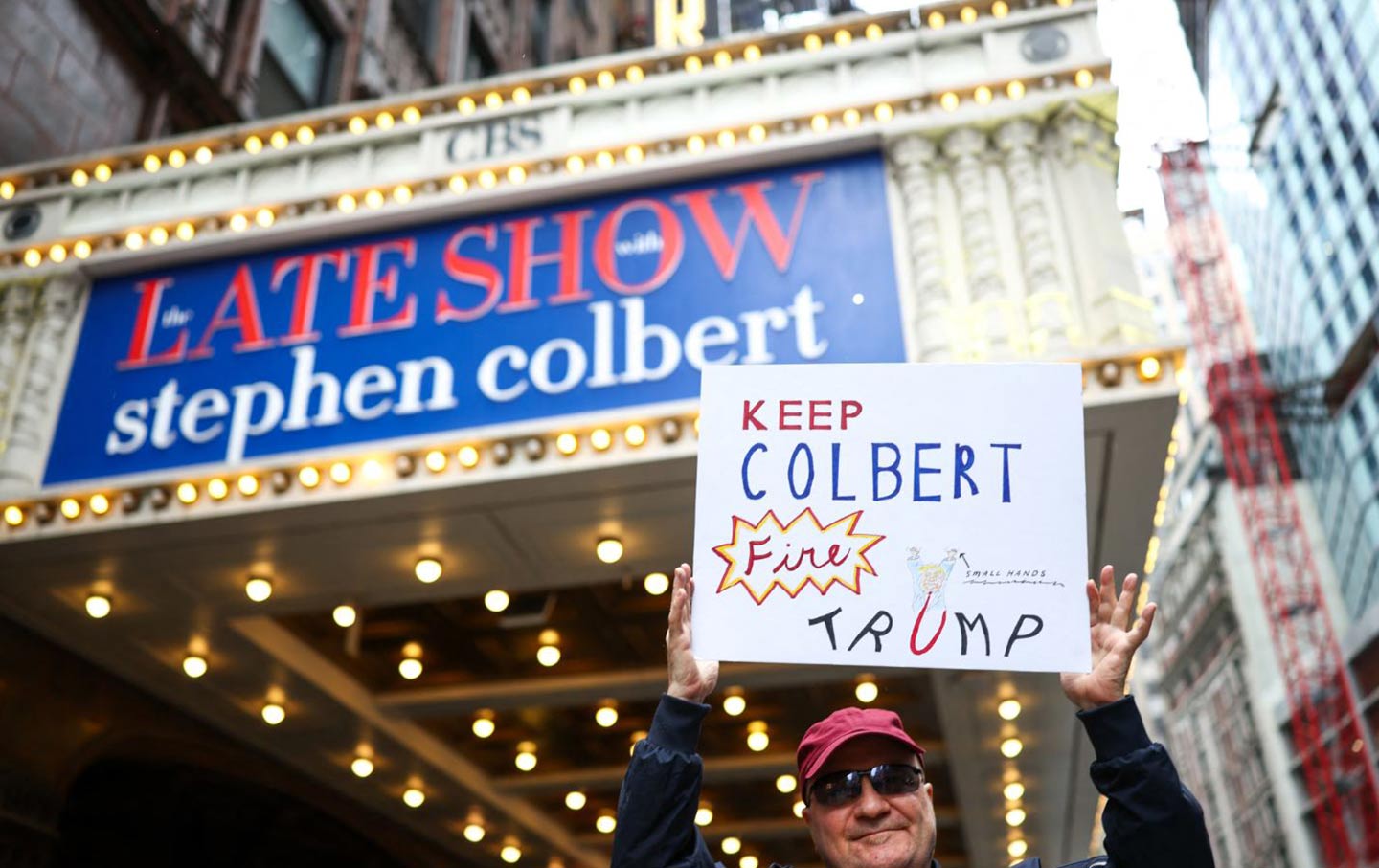 People wait in hopes of seeing Stephen Colbert outside the Ed Sullivan Theater after the taping of the final episode of The Late Show in New York, on May 21, 2026.