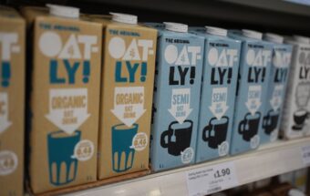 A shelf of Oatly drinks in a London supermarket.