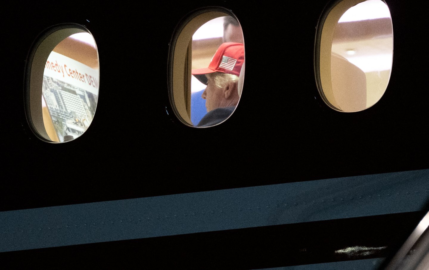 Donald Trump is seen aboard Air Force One checking a Kennedy Center large printout after landing at Joint Base Andrews, Maryland on September 16, 2026.