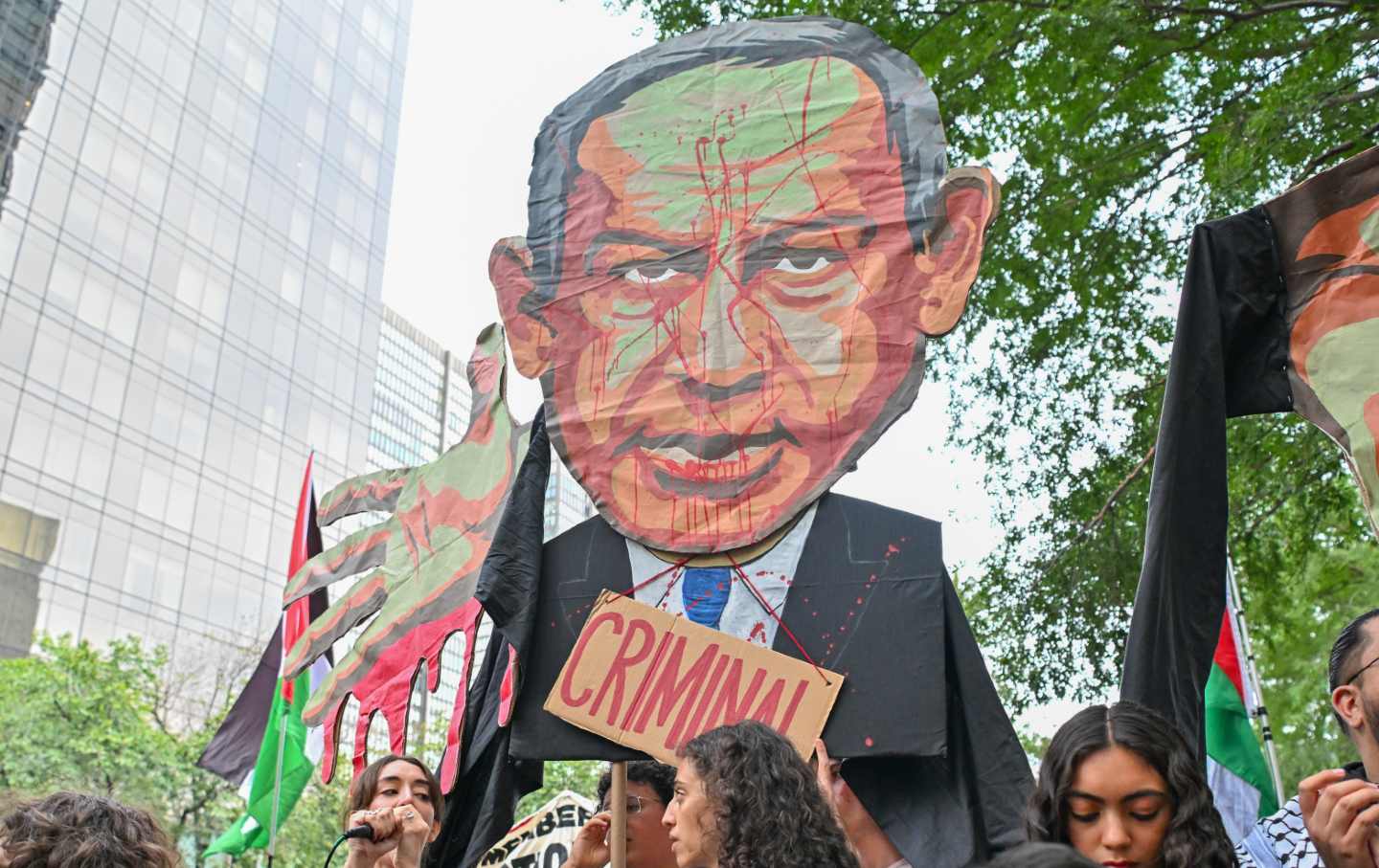 A large group of Jewish and Muslim demonstrators carrying banners and Palestinian flags march from Bryant Park toward the United Nations headquarters to protest the policies of Israeli Prime Minister Benjamin Netanyahu and US President Donald Trump regarding the war in Gaza in New York, United States, on September 24, 2026.