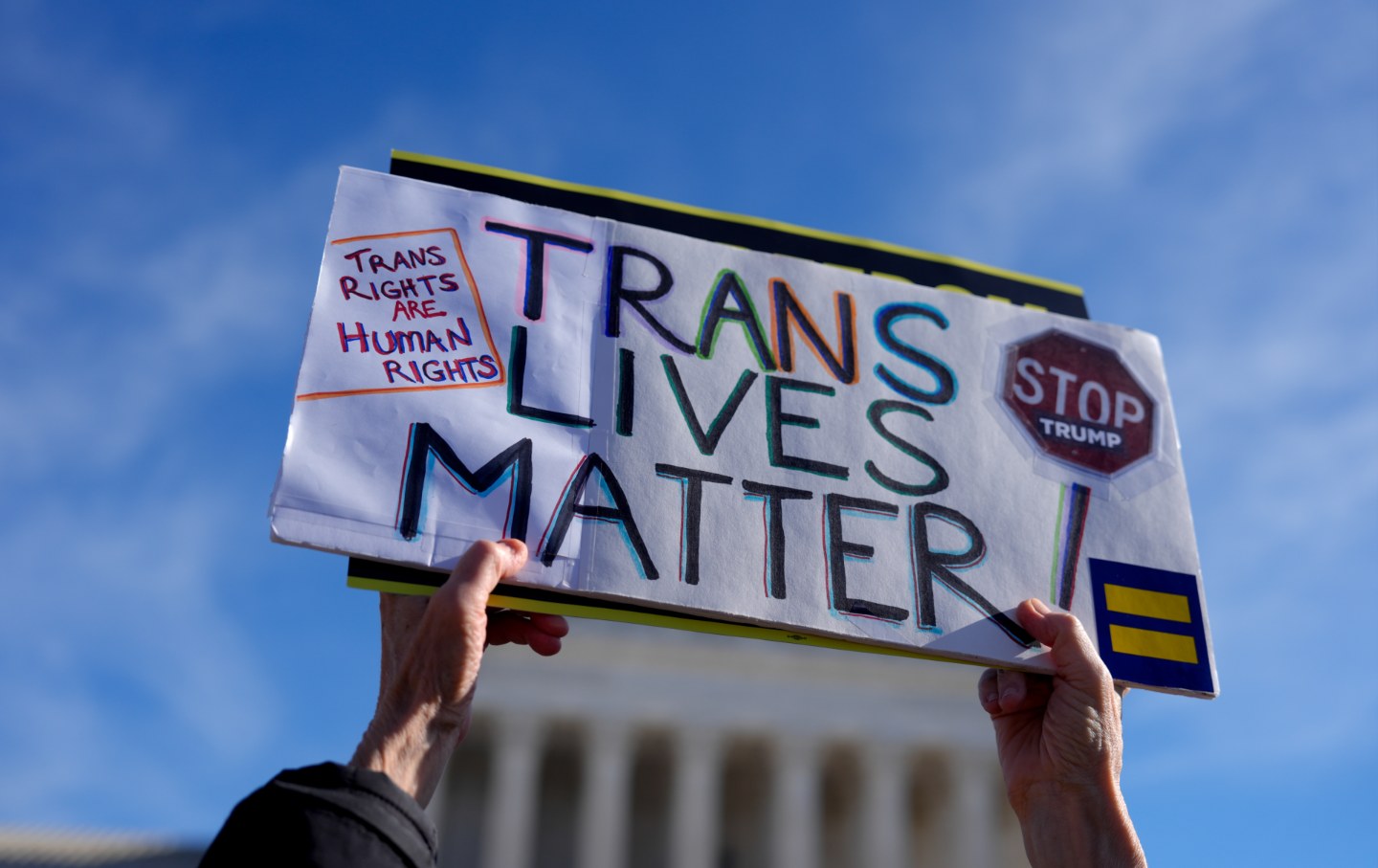 A demonstrator holds a 