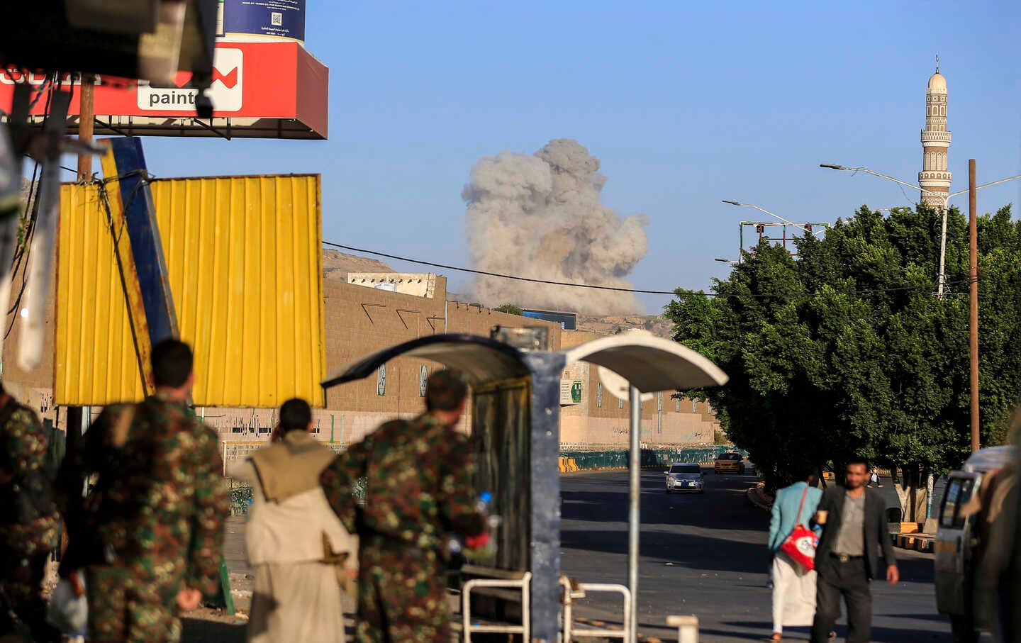 A plume of smoke rises during a reported air strike by the Saudi-led coalition on the Houthi-controlled Yemeni capital Sanaa, on October 9, 2026.