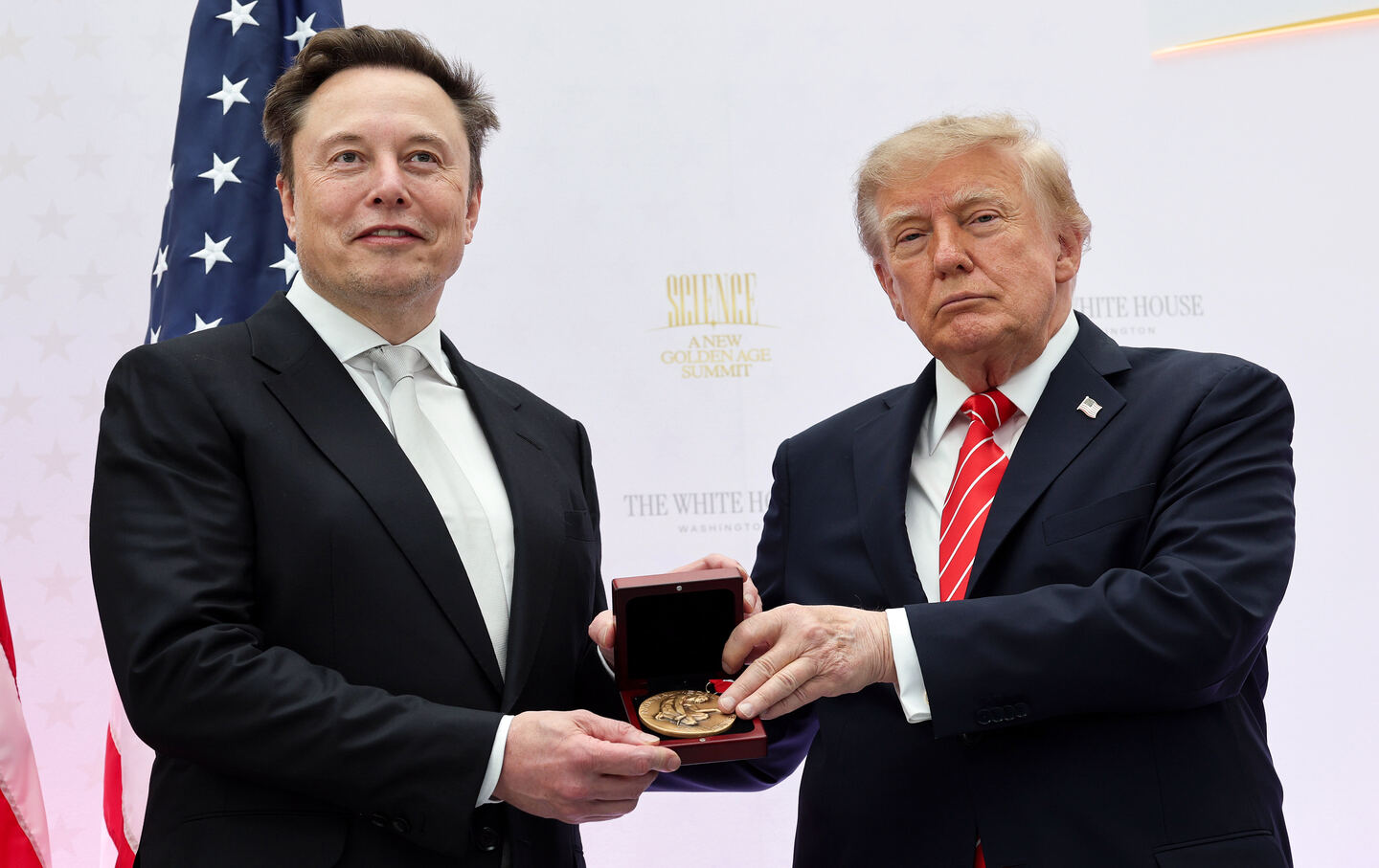 Elon Musk receives the National Medal of Science from President Donald Trump during the Golden Age of American Innovation Summit at the Institute of Peace on October 8, 2026, in Washington, DC.