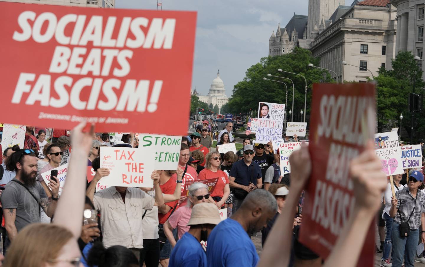 People gather for a “For the Workers, Not the Billionaires” rally on May Day, 2025, in Washington, DC.