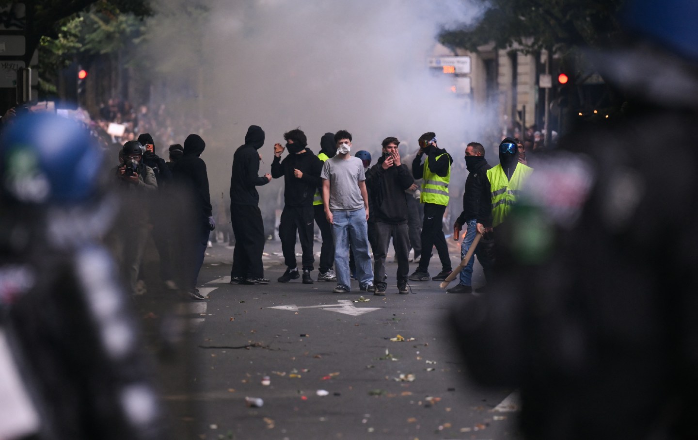 Protesters in Bordeaux, France, some in yellow vests, take part in a national mobilization alongside secondary school and university students, climate activists, and farmers on October 17, 2026.